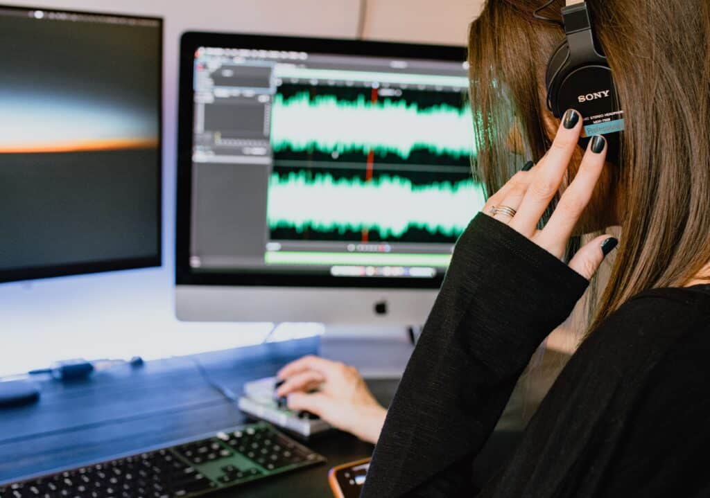 woman working on editing audio material