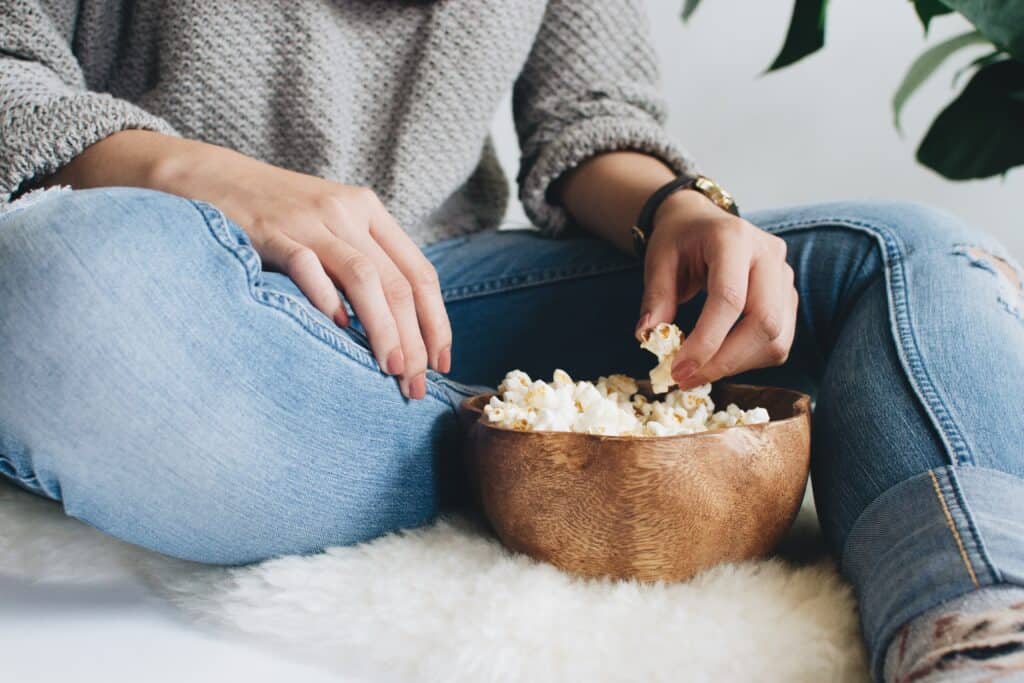 popcorn and movies during a kids' sleepoverunsplas